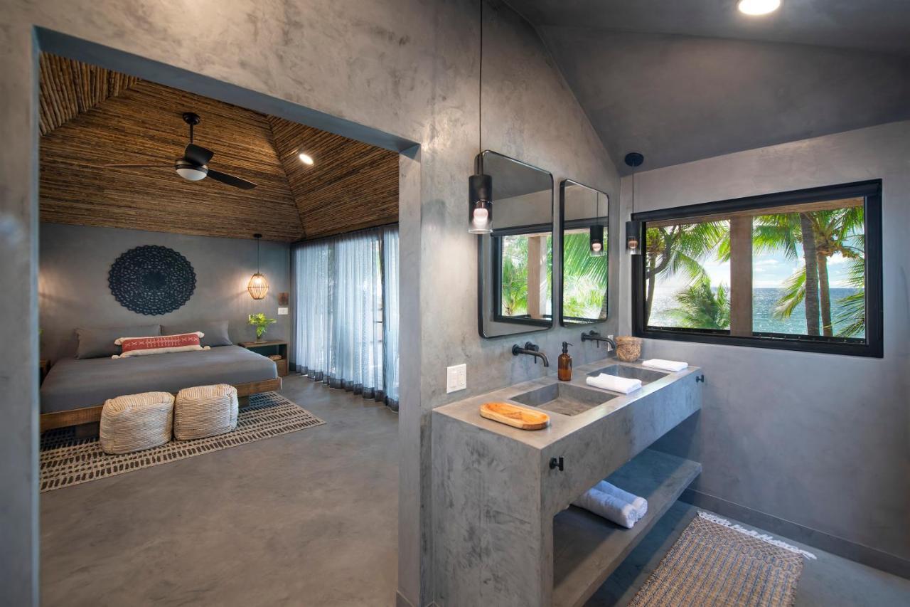 Arca Hotel West Bay Bagian luar foto