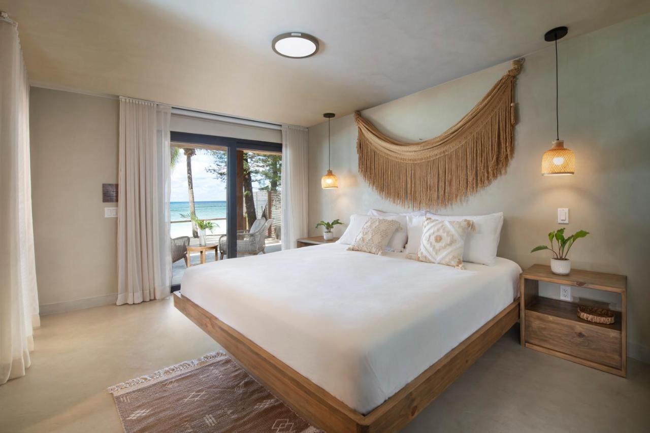 Arca Hotel West Bay Bagian luar foto