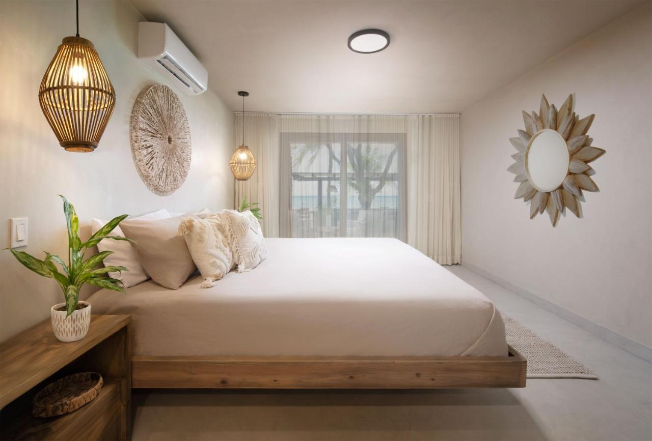 Arca Hotel West Bay Bagian luar foto
