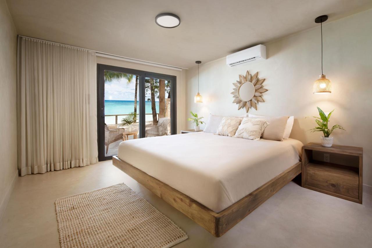 Arca Hotel West Bay Bagian luar foto